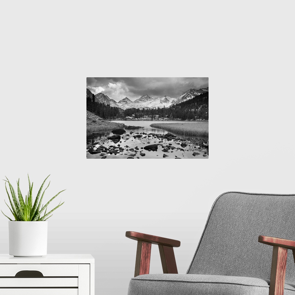 A modern room featuring Dramatic Landscape of a mountain in black and white.
