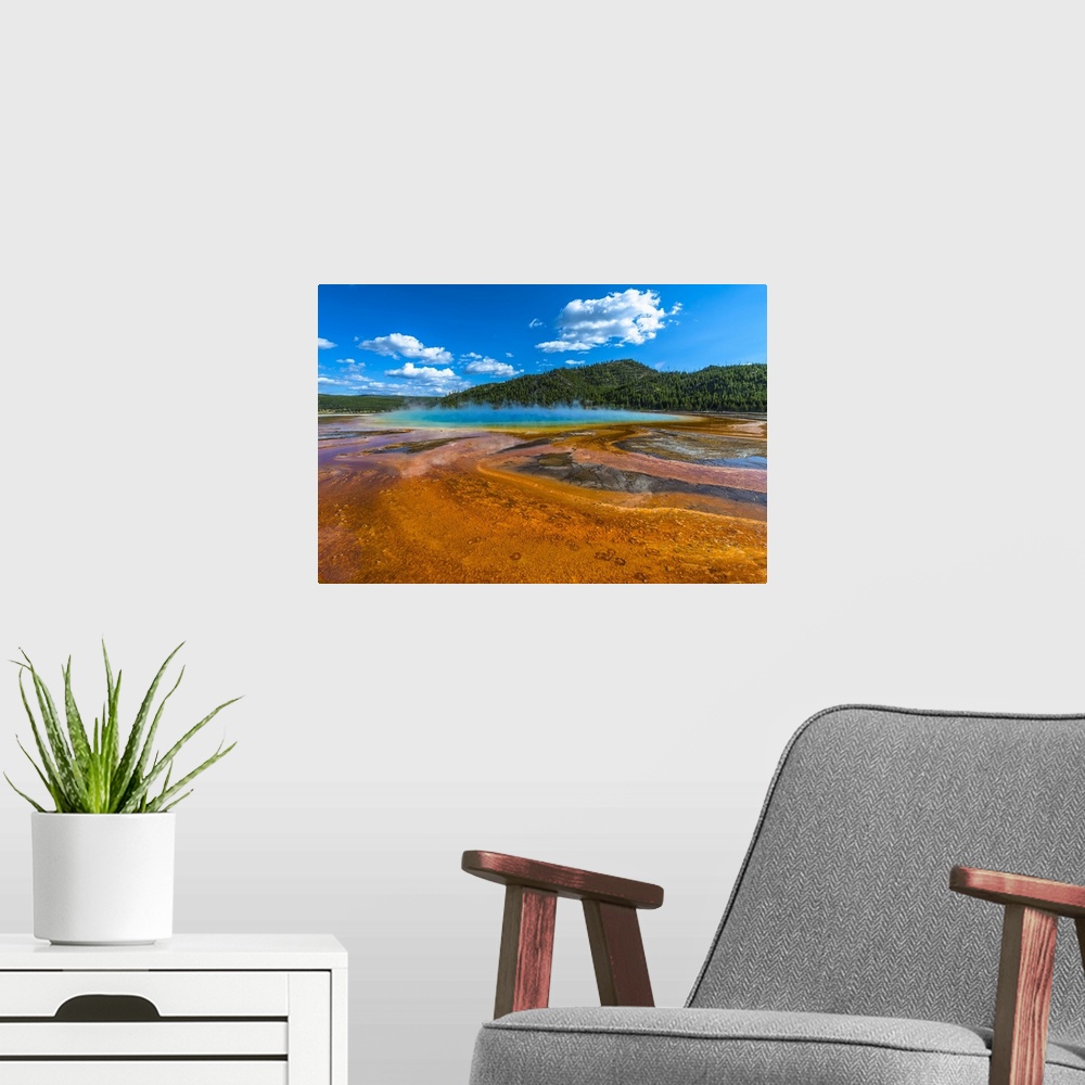 A modern room featuring Grand prismatic wide angle shot as seen from the boardwalk.