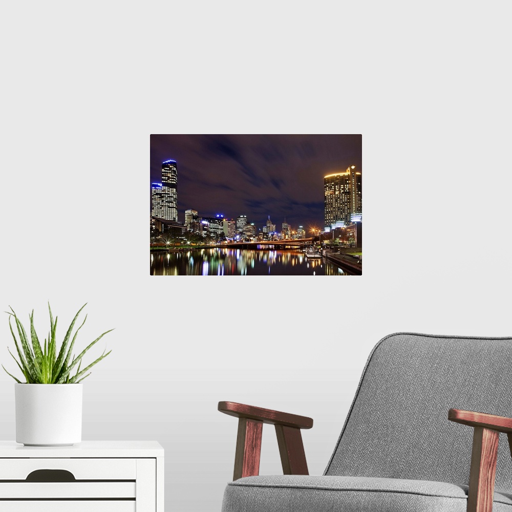 A modern room featuring Australia, Victoria, Oceania, Melbourne, The Crown Casino and the Rialto Tower at night