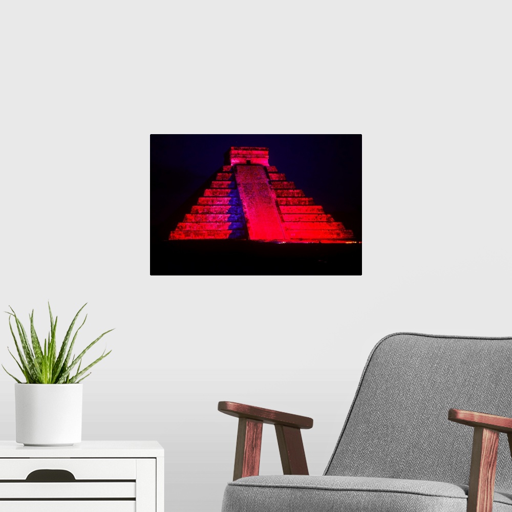 A modern room featuring The Pyramid of Kukulcan, also known as "El Castillo", is the most important monument of Chichen I...