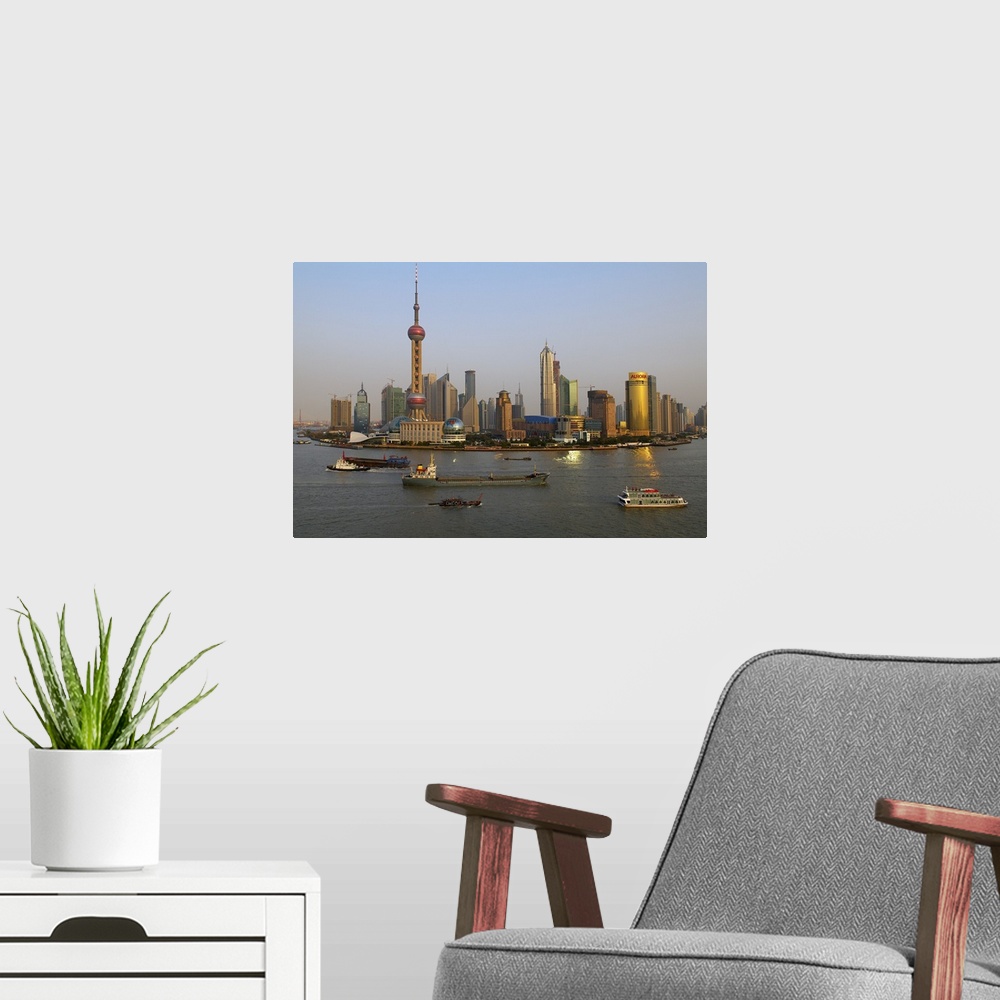 A modern room featuring China, Shanghai Shi, The Huangpu River and many of the new towers of Pudong