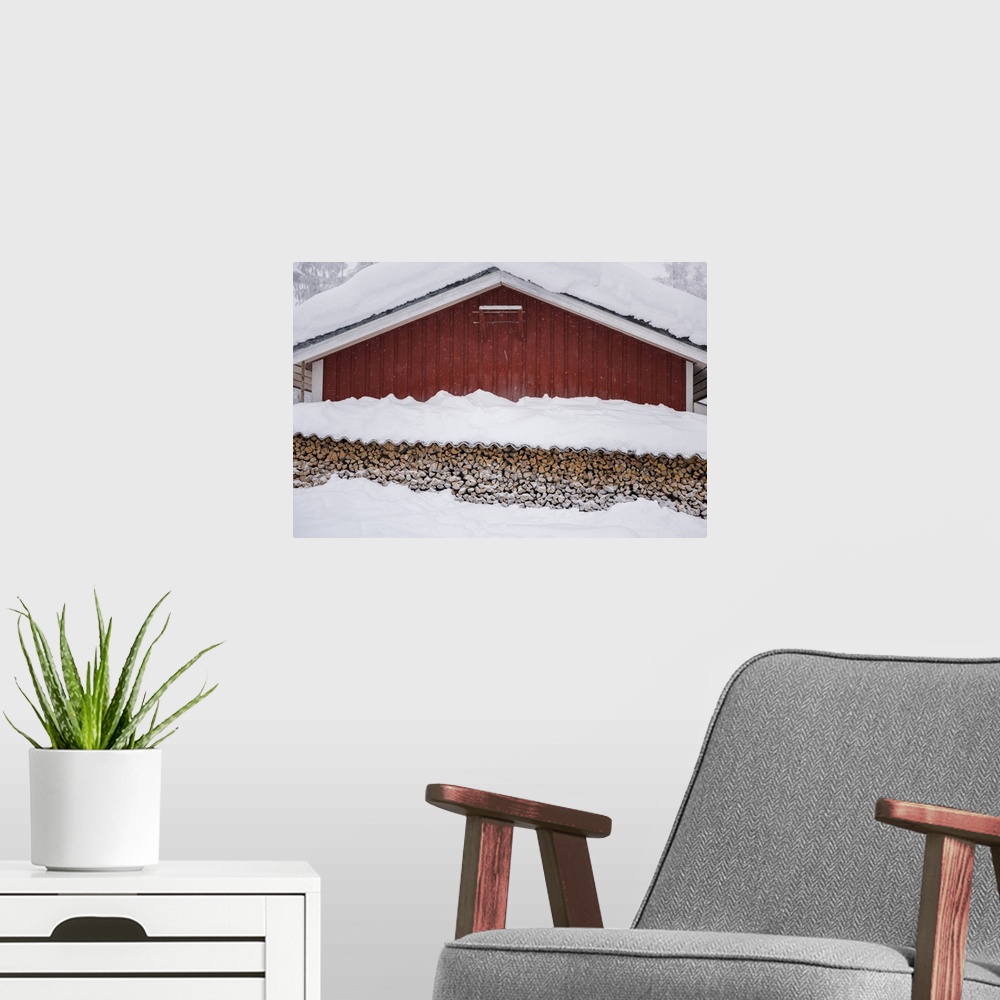 A modern room featuring Finland, Lapland, Typical house with a stack of firewood, Kittila, Scandinavia.