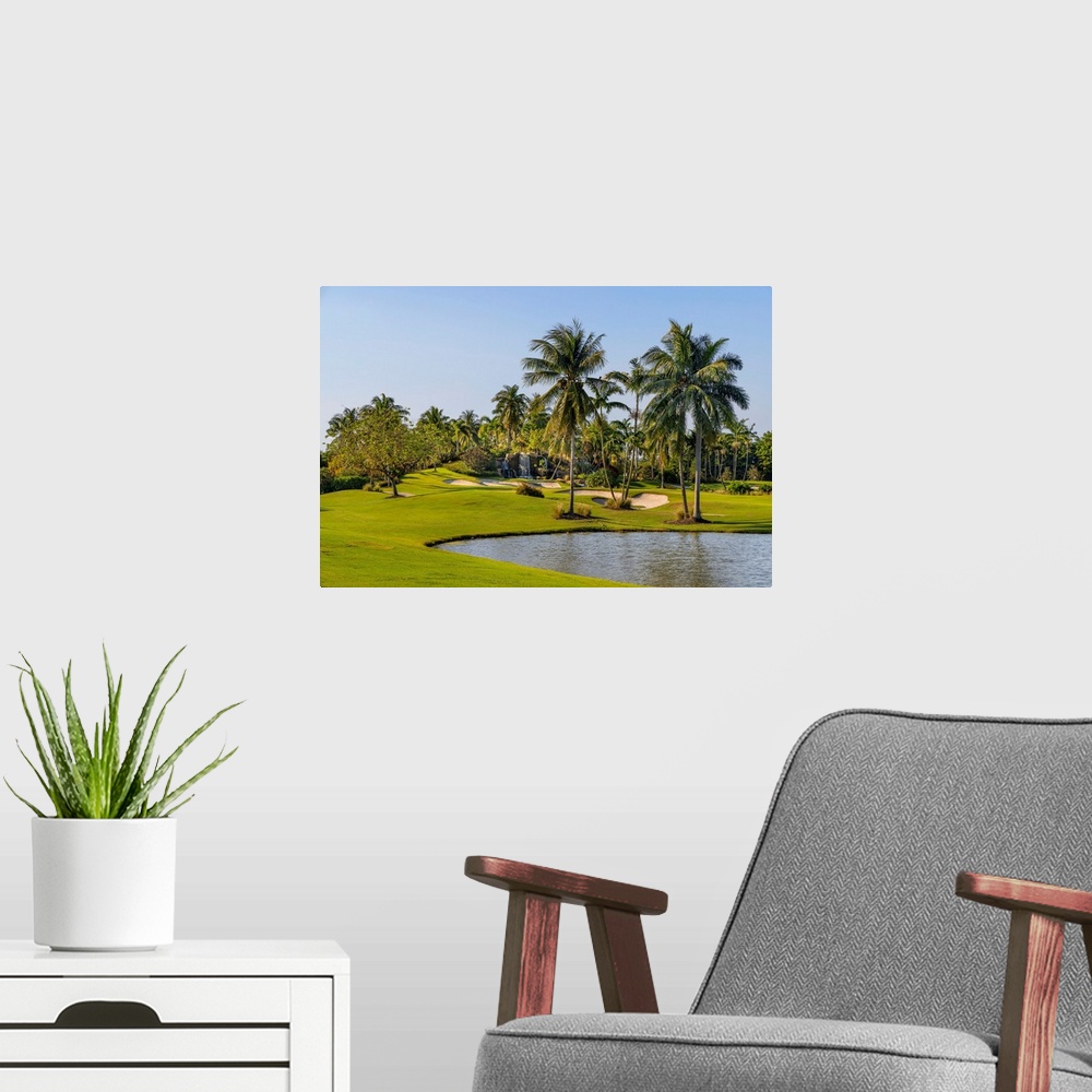 A modern room featuring Florida, Boca Raton, golf course with palm trees.