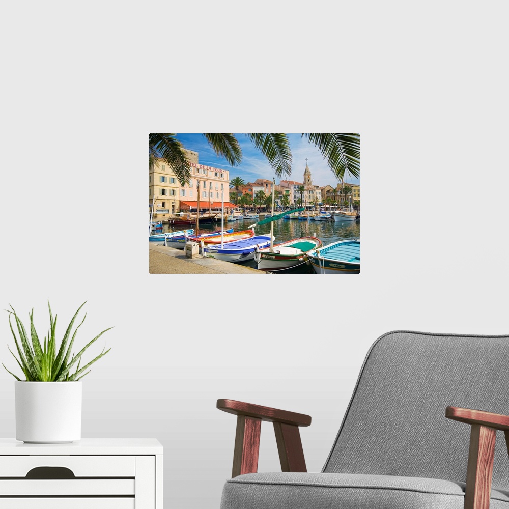 A modern room featuring France, Provence-Alpes-Cote d'Azur, Sanary-sur-Mer, View of the harbor