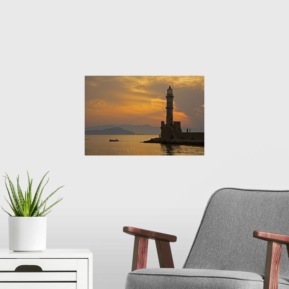 A modern room featuring Greece, Crete, Chania, Venetian lighthouse in Chania harbor at sunset