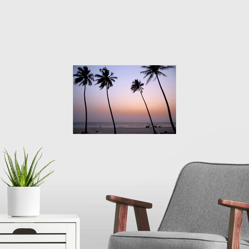 A modern room featuring India, Goa, Palms along the Colva beach at sunset
