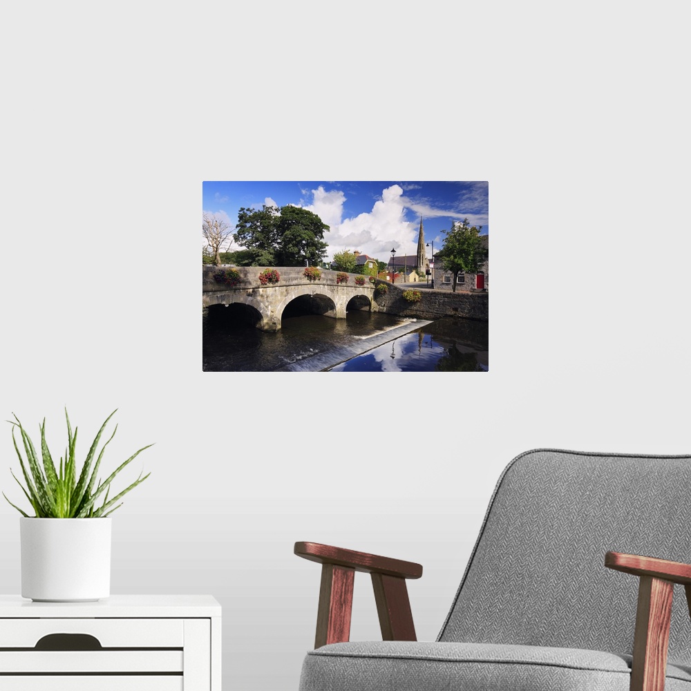 A modern room featuring Ireland, Mayo, Westport, View along The Mall with River Carrowbeg