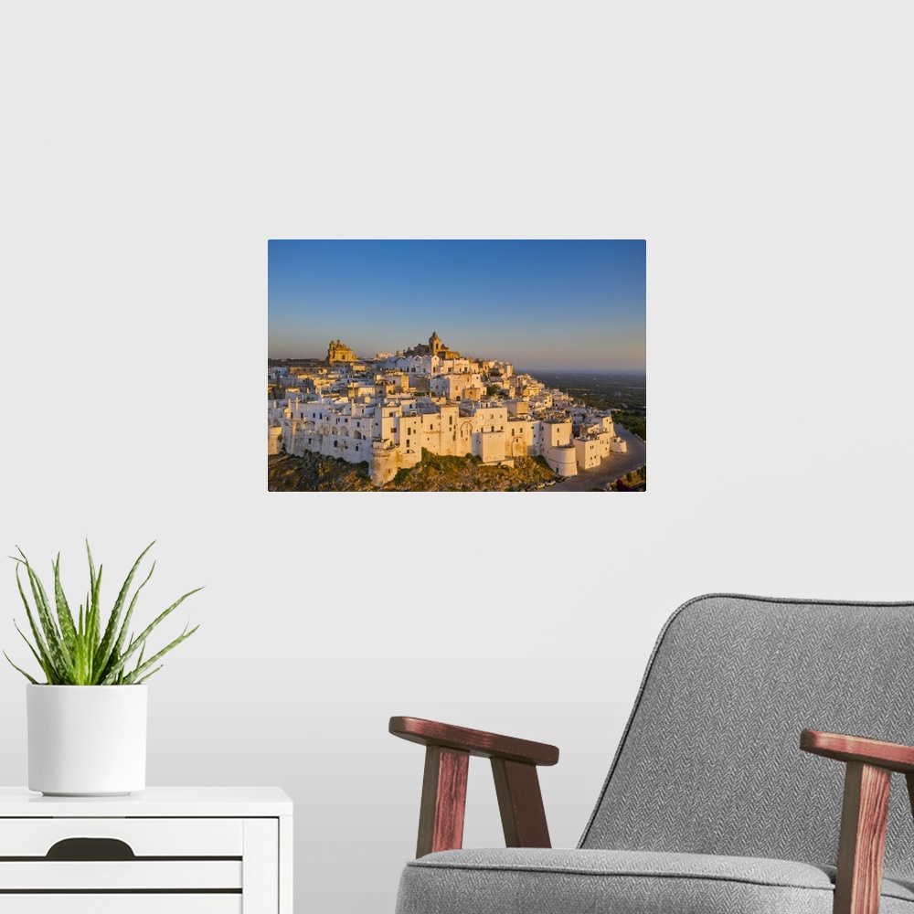 A modern room featuring Italy, Apulia, Brindisi district, Itria Valley, Ostuni, View of Ostuni village