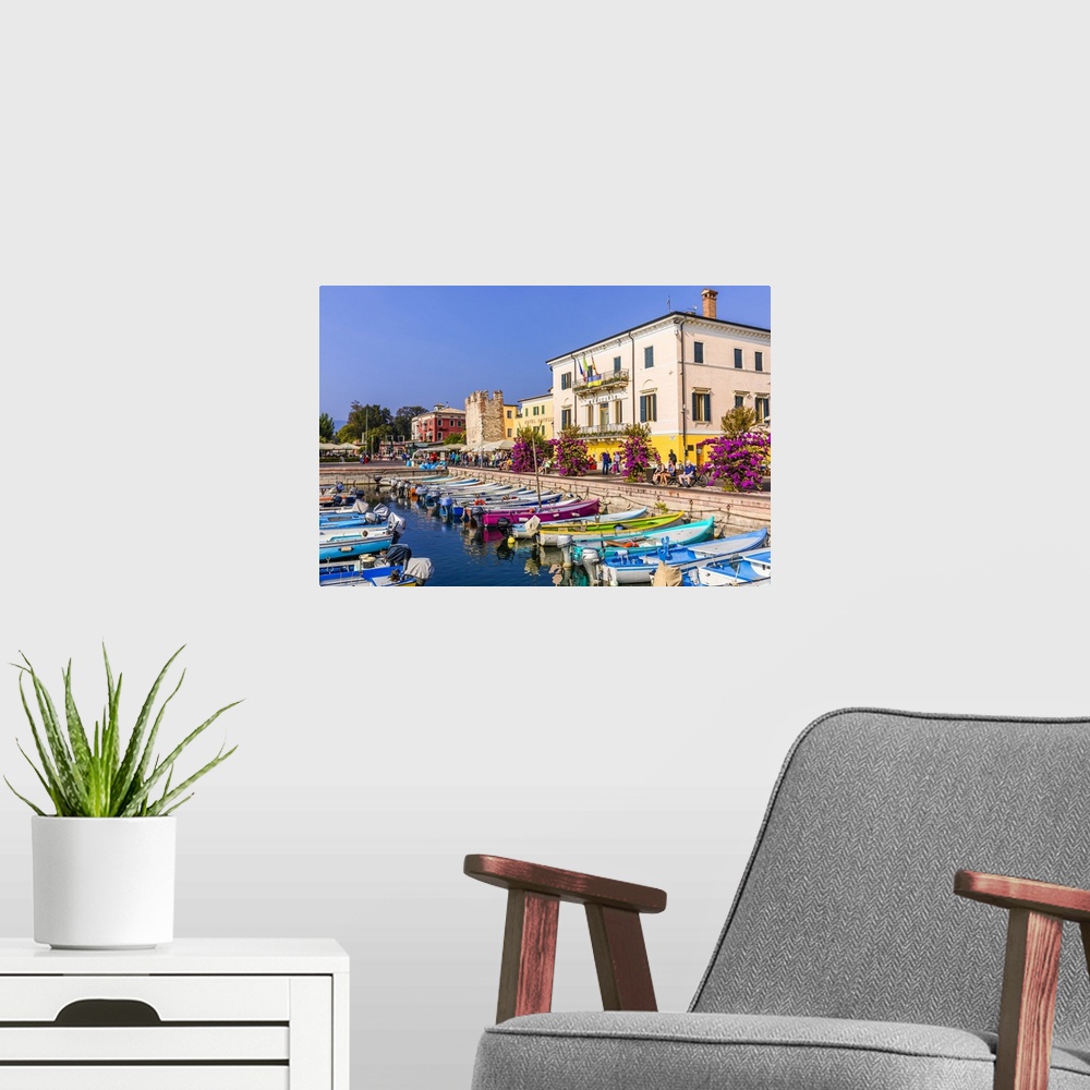 A modern room featuring Italy, Veneto, Verona district, Lake Garda, Bardolino, Marina, Medieval Tower and Albergo Catullo...