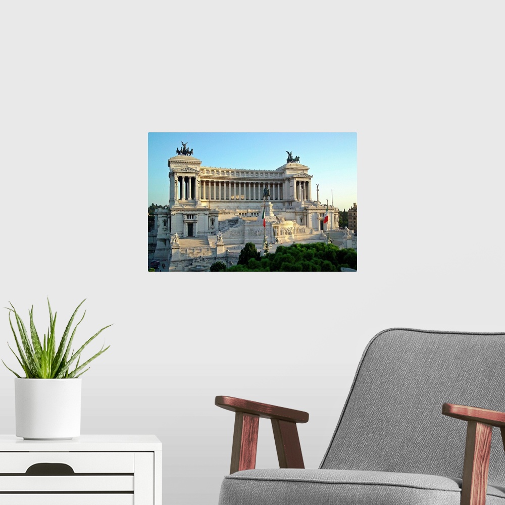 A modern room featuring Italy, Latium, Rome, Monument to Vittorio Emanuele II called Vittoriano, at sunset