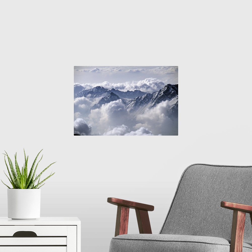 A modern room featuring Italy, Piedmont, Alps, Val d'Ossola, Clouds over the valley