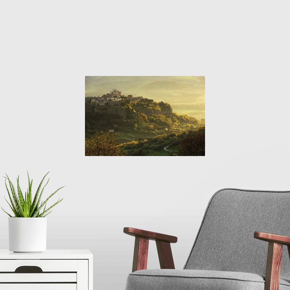 A modern room featuring Italy, Umbria, Terni district, Orvieto, Cathedral and the surrounding area at sunrise.