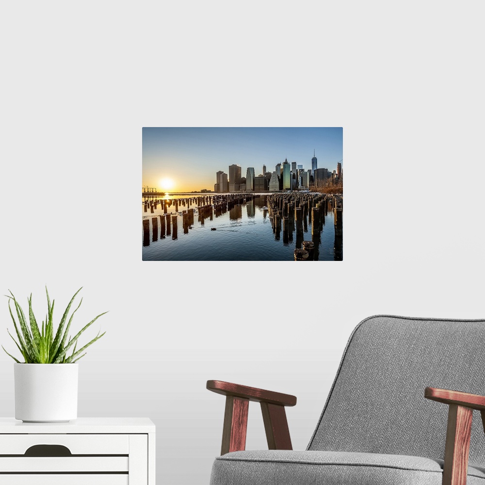 A modern room featuring USA, New York City, Manhattan, Brooklyn Bridge, Brooklyn Bridge Park, Sunset view of the East Riv...