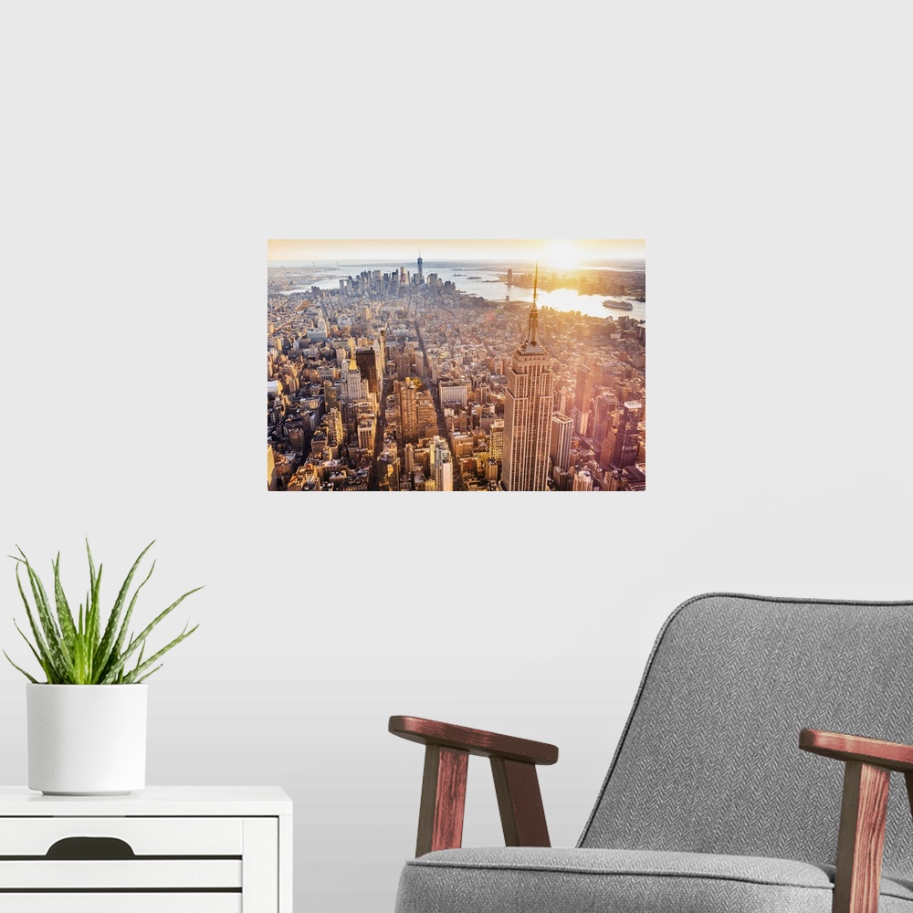 A modern room featuring USA, New York City, Manhattan, Midtown, Aerial view towards Empire State Building and One World T...