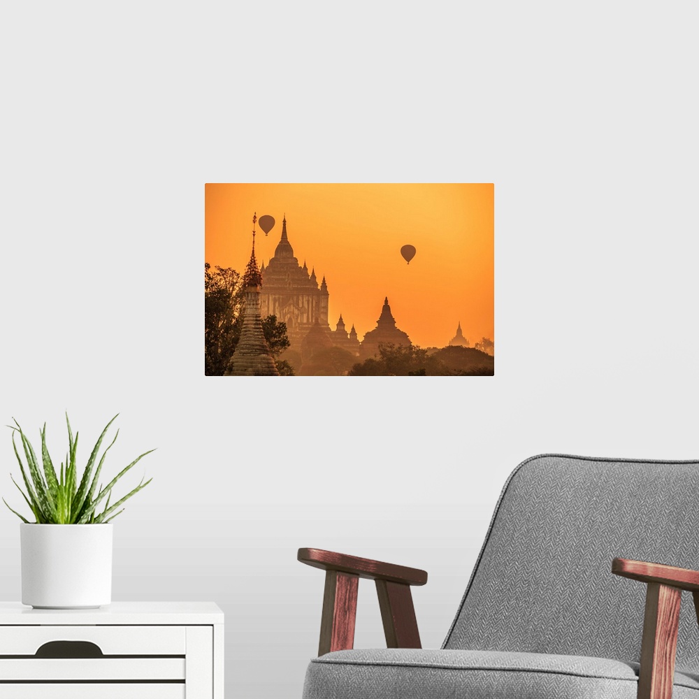 A modern room featuring Myanmar, Mandalay, Bagan, Hot air balloons over Gawdawpalin Temple at sunrise. This is the second...