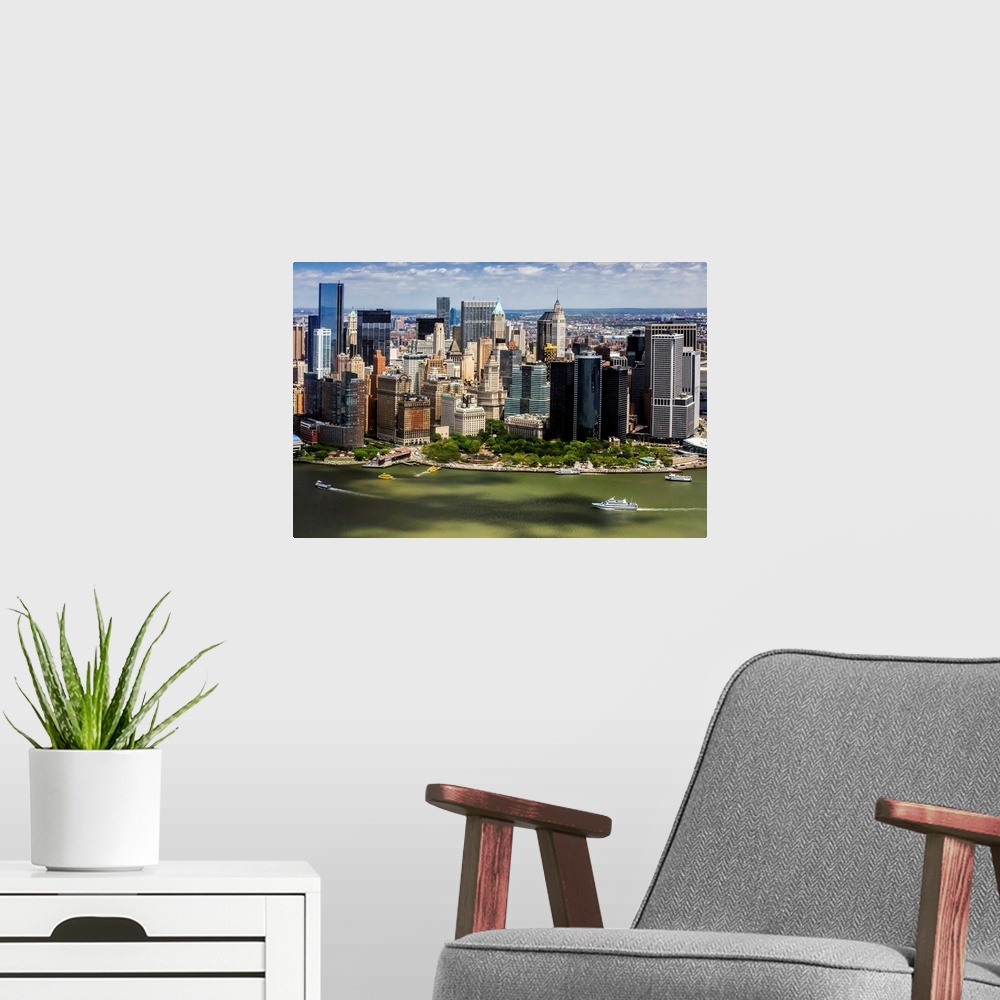 A modern room featuring New York, New York City, Manhattan, Battery park from a helicopter.