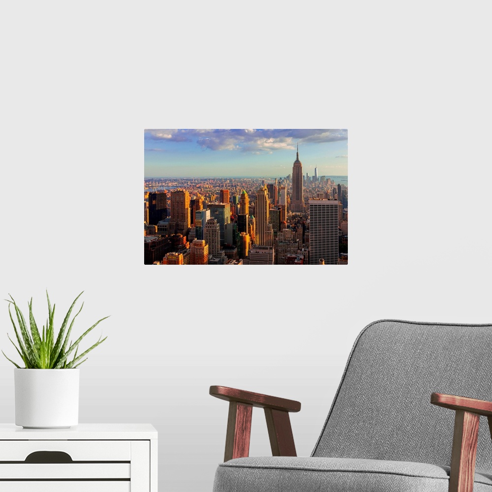 A modern room featuring USA, New York City, Manhattan, Midtown, Cityscape from Top of the Rock at the Rockefeller Center.