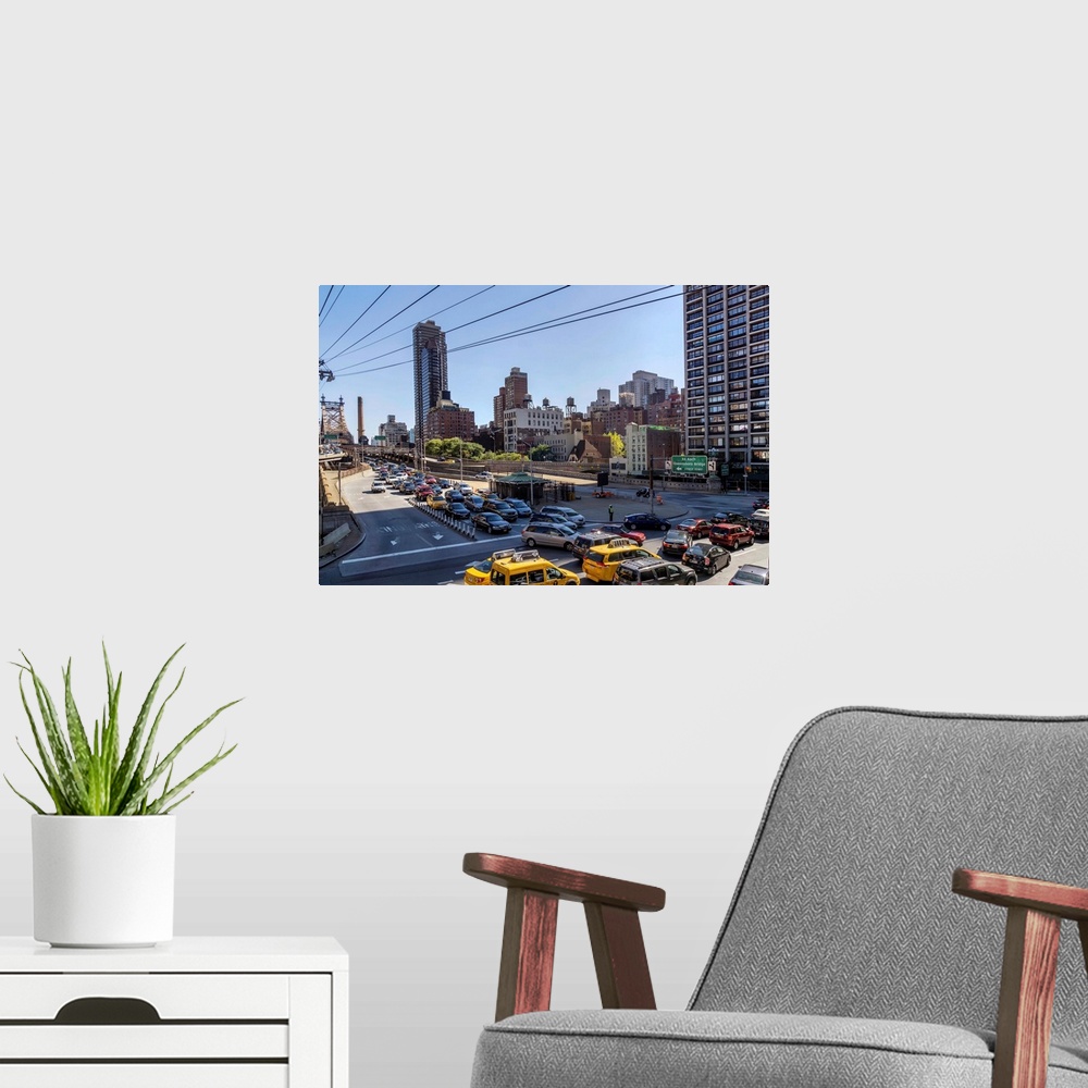 A modern room featuring New York, NYC, Manhattan, Queensboro Bridge Traffic viewed from Roosevelt Island Tram.