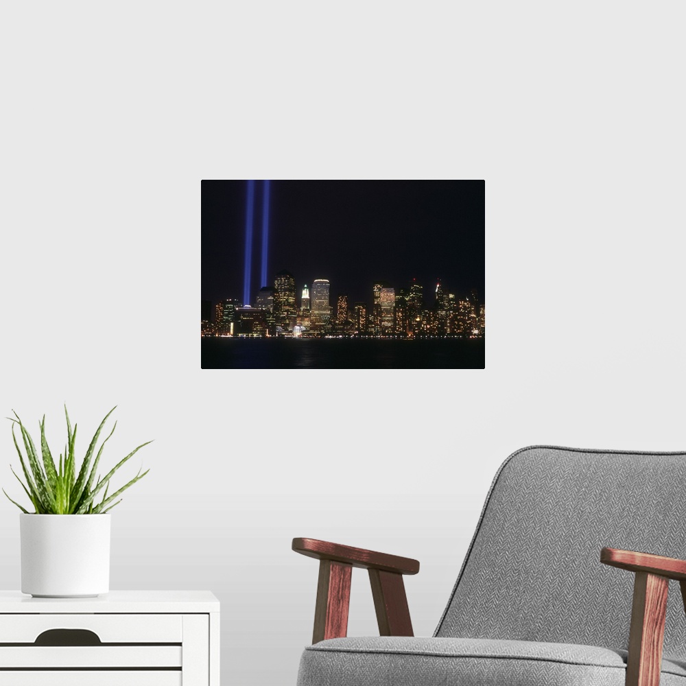 A modern room featuring New York State, Manhattan, NYC, Tribute in Light to the fallen Twin Towers