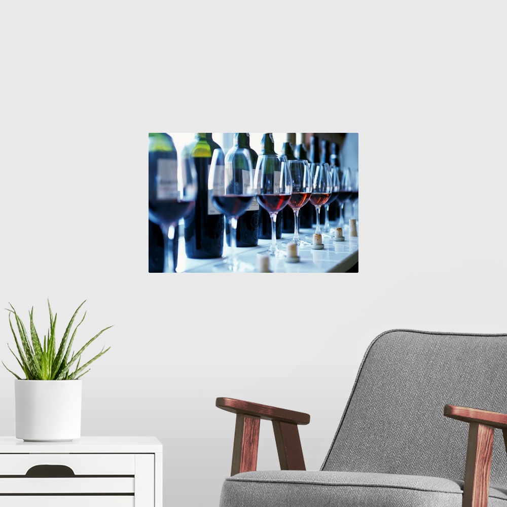 A modern room featuring Portugal, Oporto, Bottles of Ramos Pinto, red wine