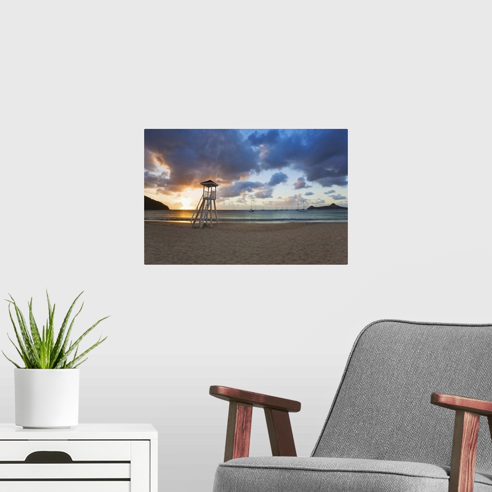 A modern room featuring St Lucia, Gros Islet, Rodney Bay, Reduit Beach sunset, Pigeon Island in the background