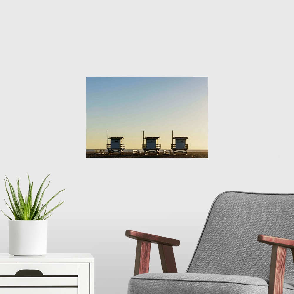 A modern room featuring USA, California, Los Angeles, Venice Beach, Lifeguard towers at sunset.