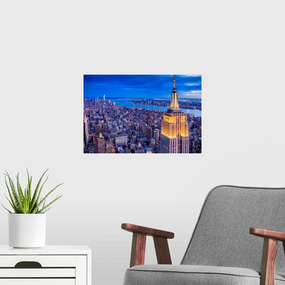 A modern room featuring USA, New York City, Manhattan, Midtown, Empire State Building, Hudson, Aerial view towards Empire...