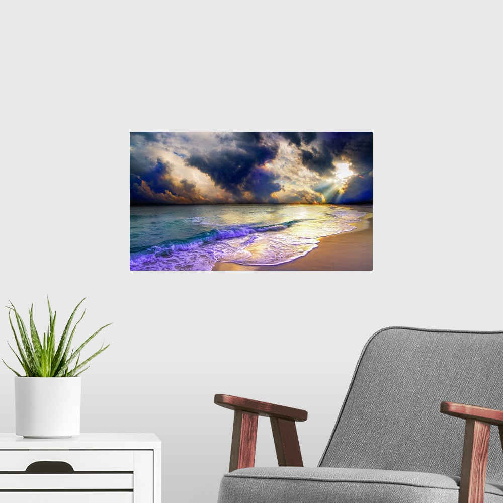 A modern room featuring A panoramic beach sunset with blue clouds and ocean waves.