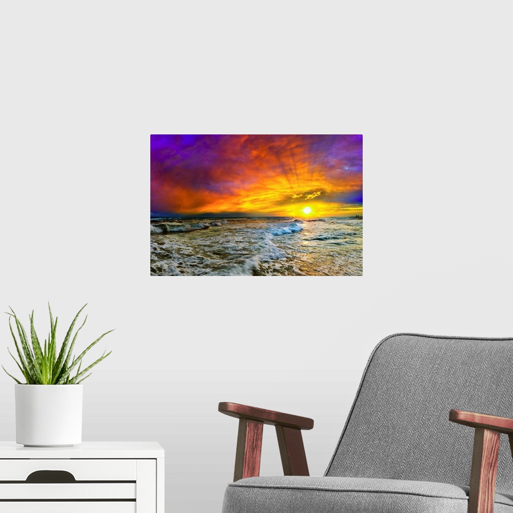 A modern room featuring A beautiful purple, blue, and red sunset with shooting sun rays over the ocean. The yellow sun ca...