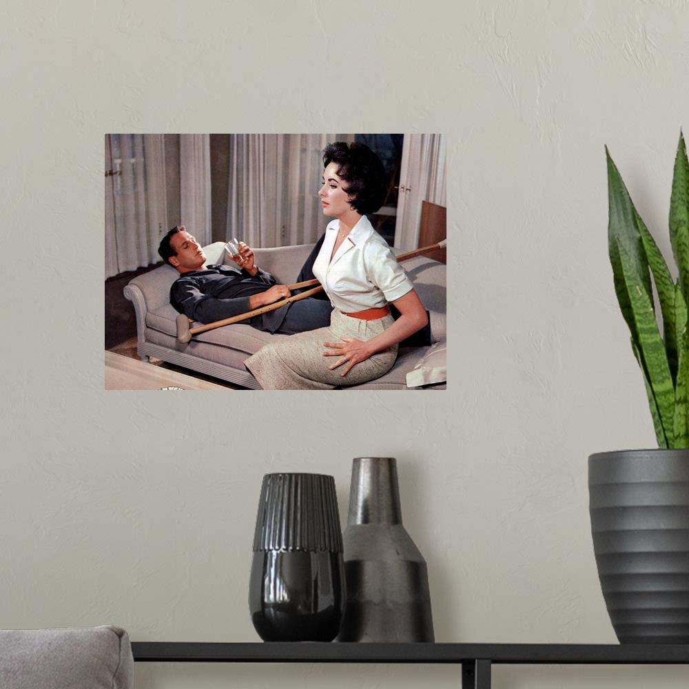 A modern room featuring Elizabeth Taylor and Paul Newman in Cat On A Hot Tin Roof - Movie Still