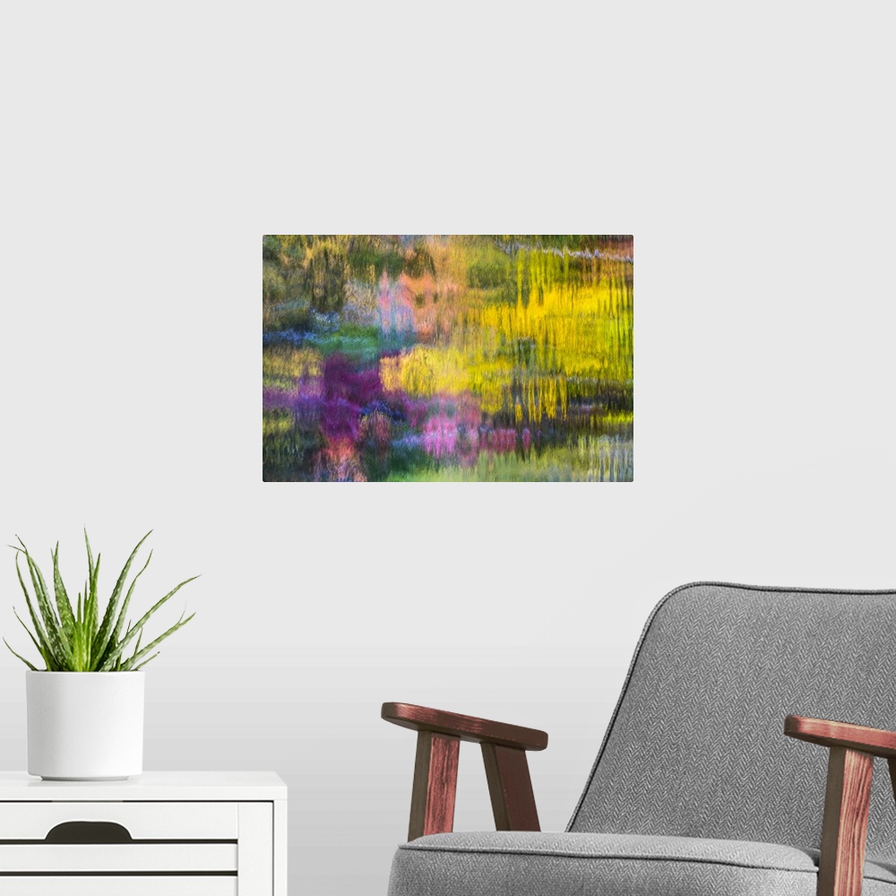A modern room featuring Reflections of a colorful forest in rippling water, creating an abstract image.