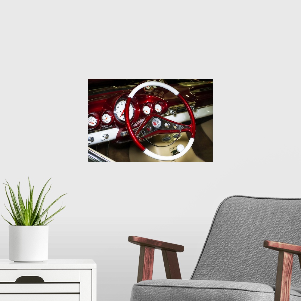 A modern room featuring Fine art photograph of the retro steering wheel and dashboard of a vintage car.