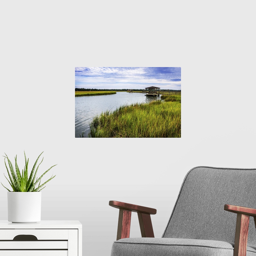 A modern room featuring A gazebo overlooking the water in a marsh. Pawleys Island, South Carolina