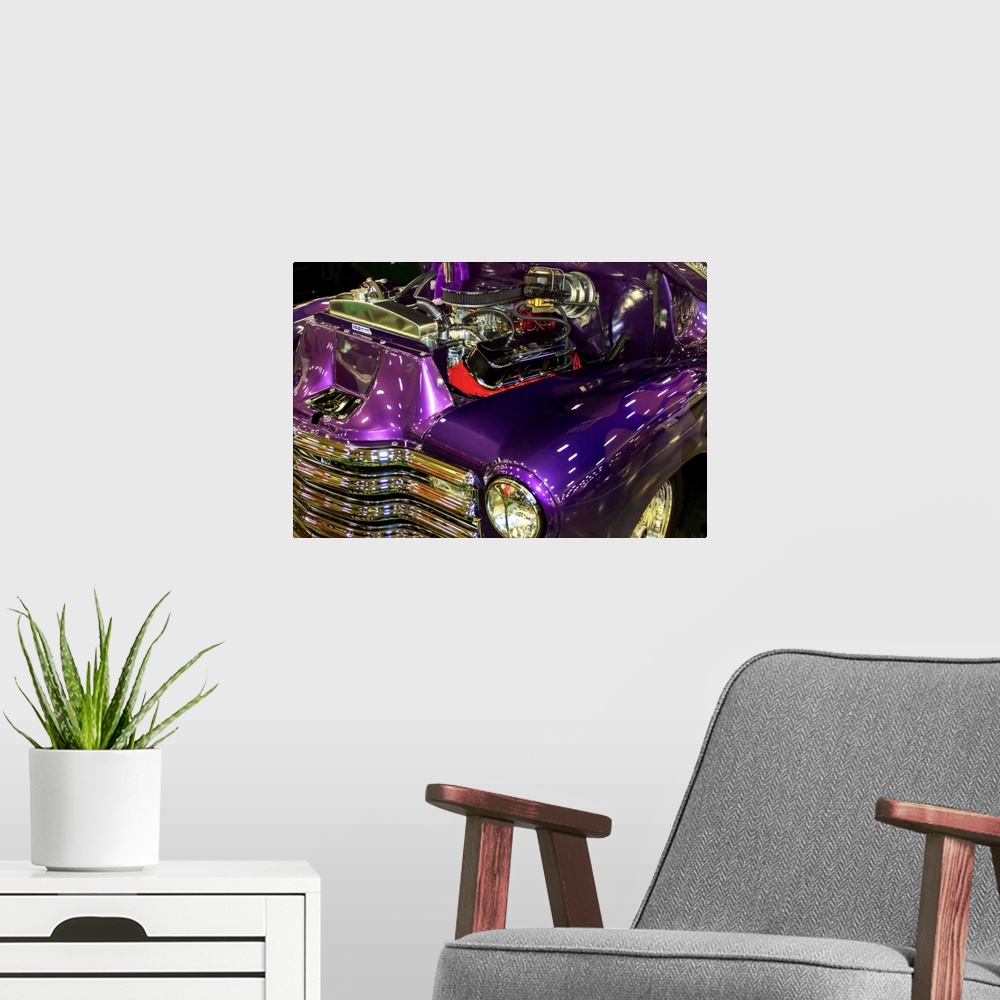 A modern room featuring Fine art photograph of a vintage car. The engine is visible and the paint job is a stunning purple.