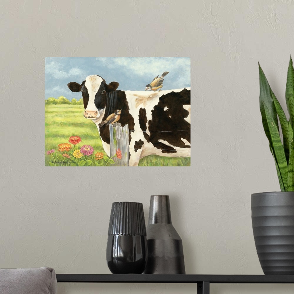 A modern room featuring Contemporary painting of a cow with a bird on its back standing in a field behind a wire fence.