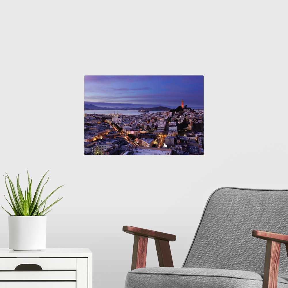 A modern room featuring Aerial view of San Francisco at dusk.