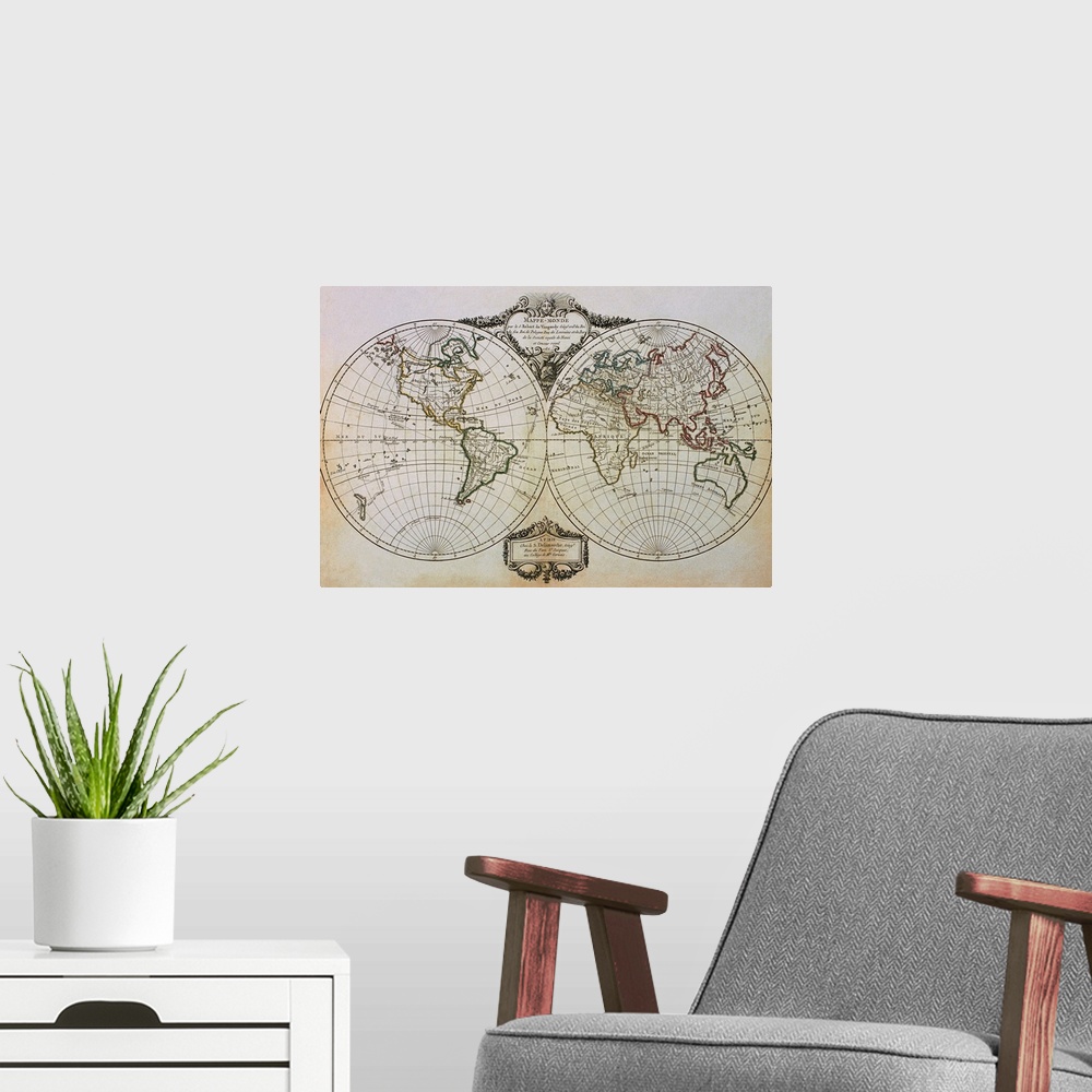 A modern room featuring An antique map of the world showing one half in a circle and the other half in another circle jus...