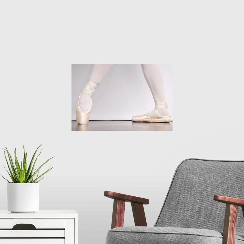 A modern room featuring Ballerina in pointe shoes