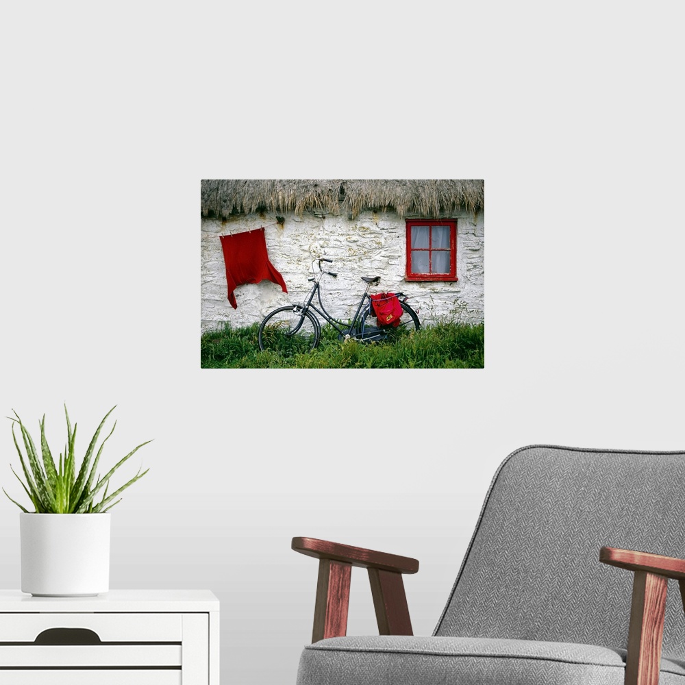 A modern room featuring Bicycle outside a cottage, Cregnesh, Isle of Man, British Isles