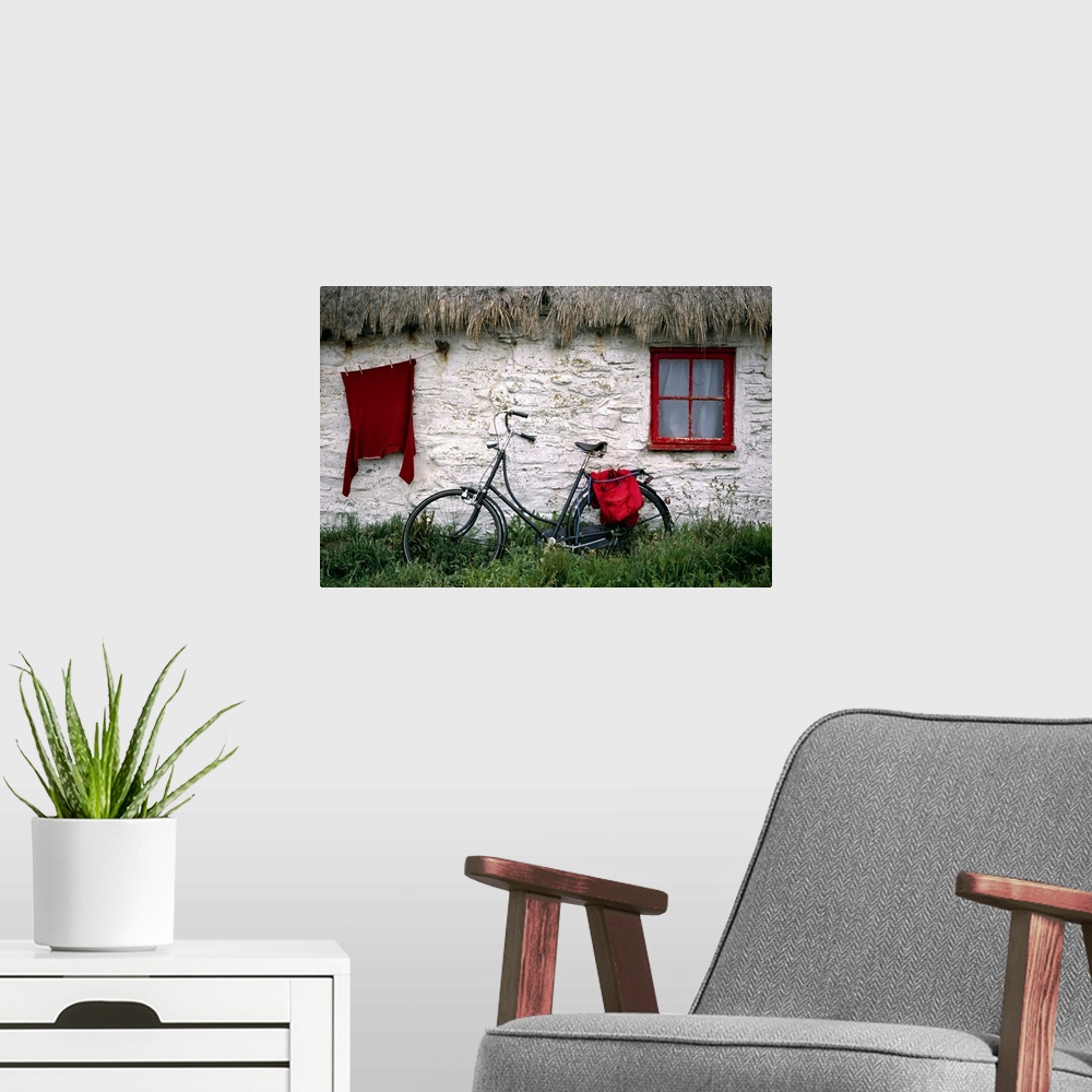 A modern room featuring Bike in front of cottage, Isle of Man