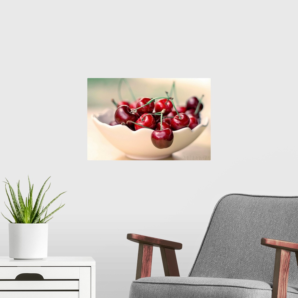 A modern room featuring Bowl of cherries.