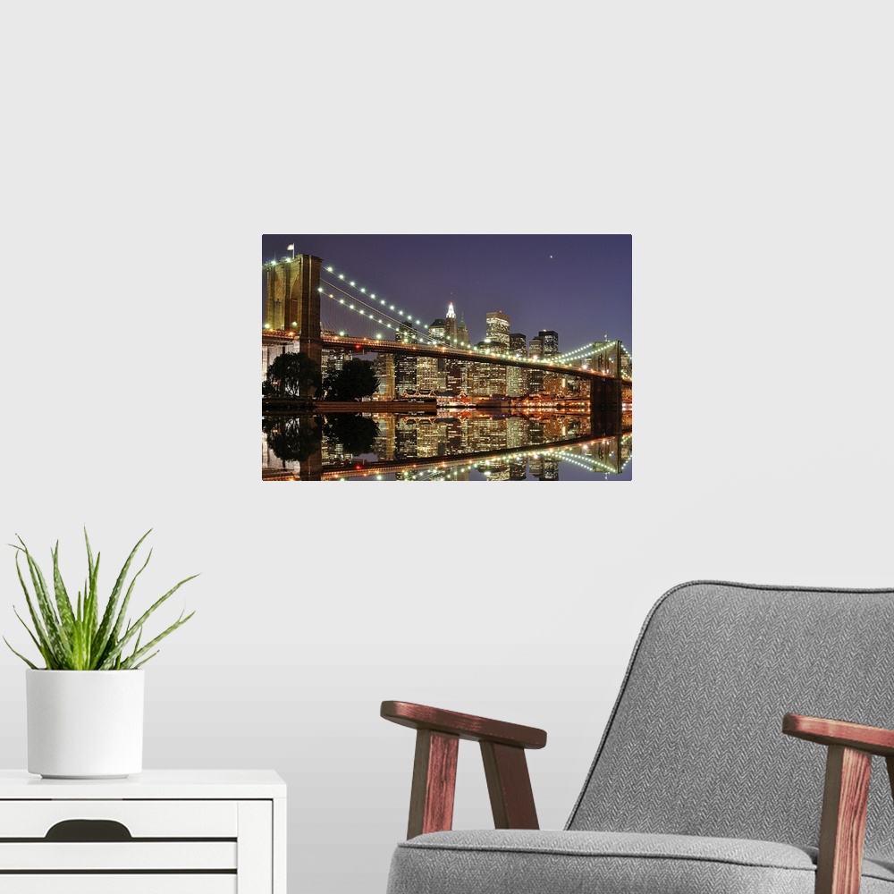A modern room featuring Beautiful artwork for the home or office of the Brooklyn Bridge illuminated at night with the sky...