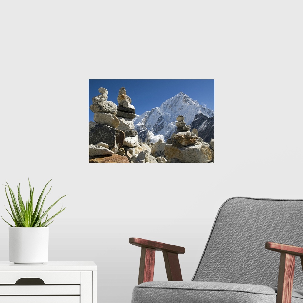 A modern room featuring Cairns marking the route to Mount Everest base camp.