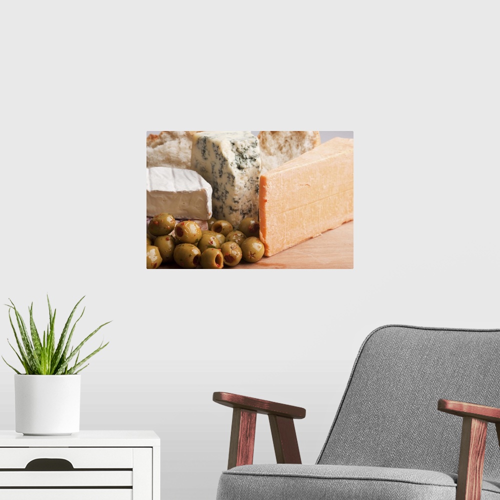 A modern room featuring chese and olives