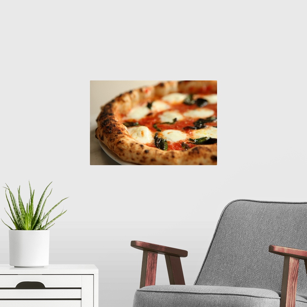 A modern room featuring Close-up of a whole pizza pie