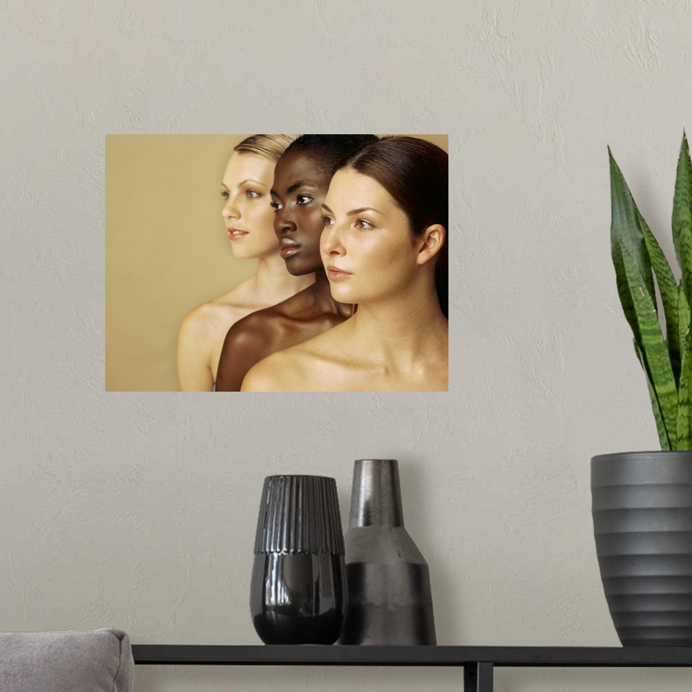 A modern room featuring Close-up of three young women looking away