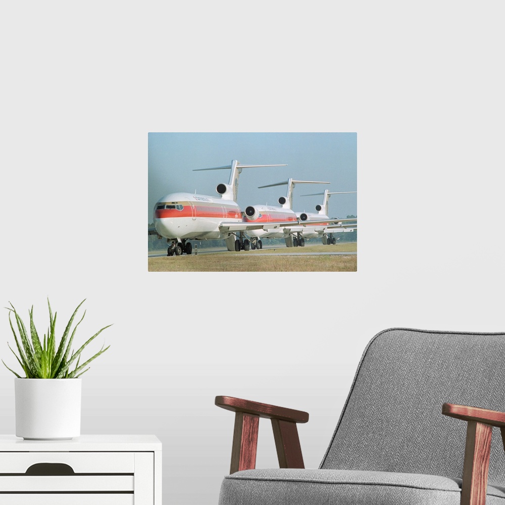 A modern room featuring Houston, Texas: Continental airlines jetliners stand idle at Houston Intercontinental airport, 9/...