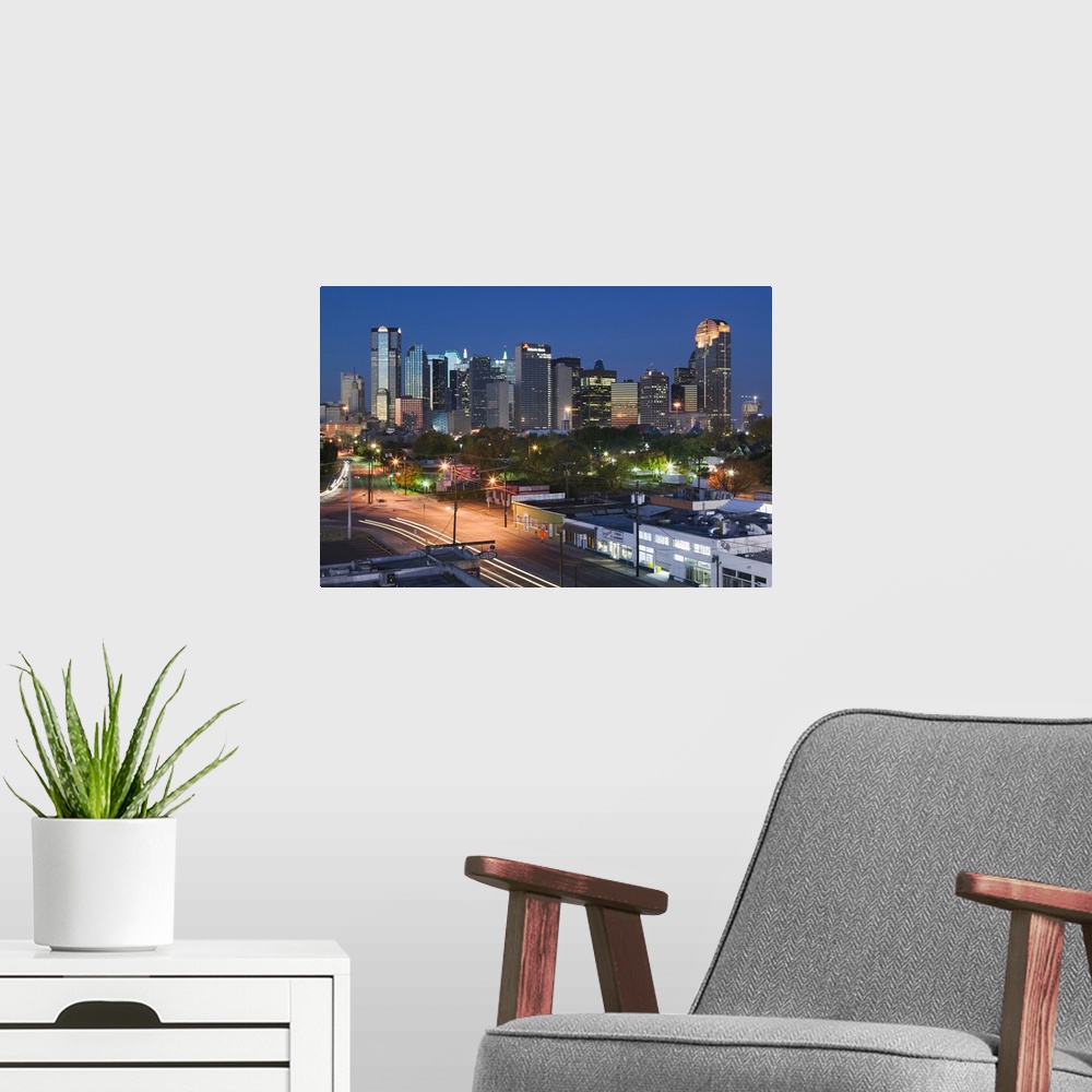 A modern room featuring Dallas, Texas, skyline at dawn