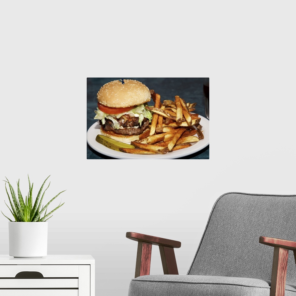 A modern room featuring large double half pound burger fries and cola meal