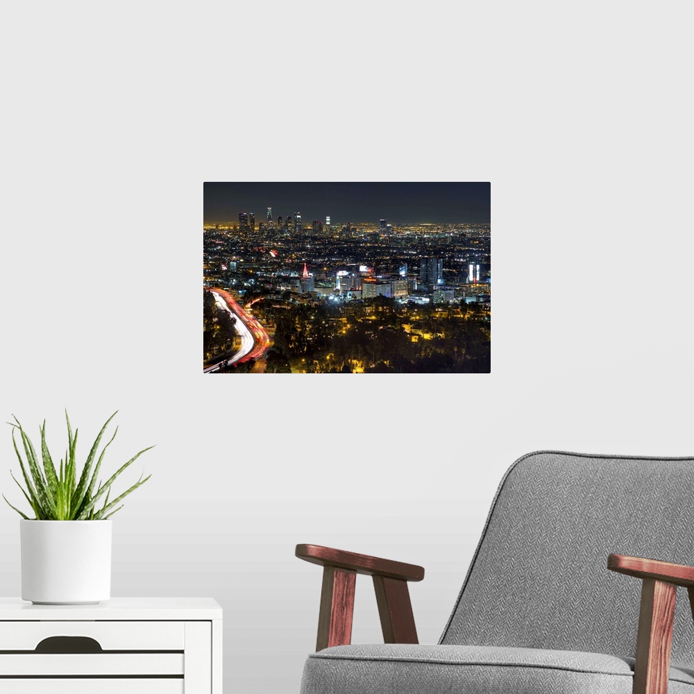 A modern room featuring Aerial view of Hollywood at night